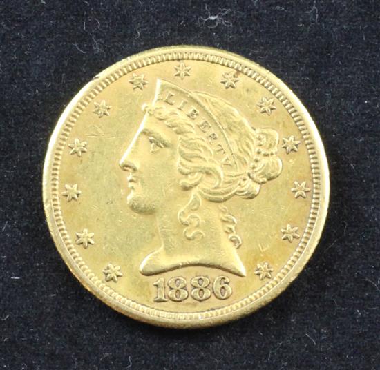 A US 1886 five dollar gold coin.